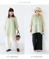 Layered collar and color-coordinated floral embroidery top