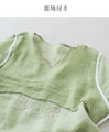 Layered collar and color-coordinated floral embroidery top