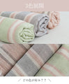 Soft shawl with light-colored stripes
