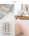 Soft shawl with light-colored stripes