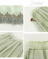 A luxurious embroidered skirt woven with two-color threads