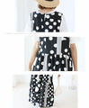 Random polka dots make a statement look