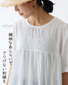A top with subtle embroidery and delicate details