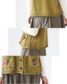 Rainbow colored yarn grape and flower vest
