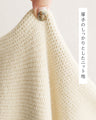 Knit vest with covered buttons