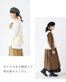 Knit vest with covered buttons