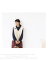 Knit vest with covered buttons