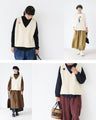 Knit vest with covered buttons
