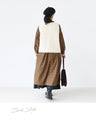 Knit vest with covered buttons