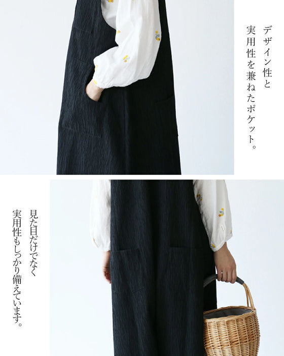 Woven fabric overalls with vertical lines