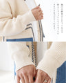 A knitted cardigan with different materials
