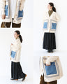 A knitted cardigan with different materials