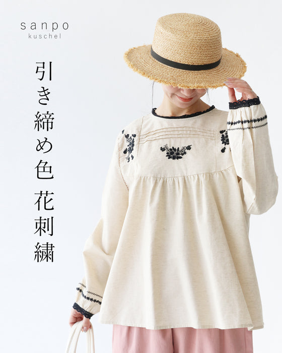 引き締め色花刺繍ブラウス