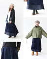 A skirt made of different materials that can be worn as a flare or a bud