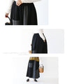 A skirt with a playful asymmetrical design and different material switching