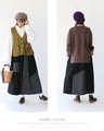 A skirt with a playful asymmetrical design and different material switching