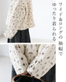 Outerwear surrounded by small flowers