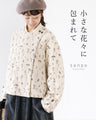Outerwear surrounded by small flowers