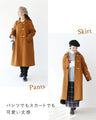 A slimming coat with eye-catching buttons