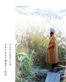 A slimming coat with eye-catching buttons