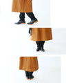 A slimming coat with eye-catching buttons