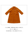 A slimming coat with eye-catching buttons
