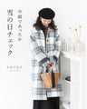 Warm padded checked coat for snowy days