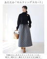 Quilted skirt with floral stitching