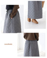 Quilted skirt with floral stitching