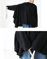 Loose knit poncho A poncho that covers your body shape