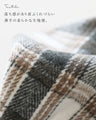 A stylishly concealed poncho-style dress