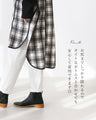 A stylishly concealed poncho-style dress