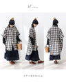 A stylishly concealed poncho-style dress