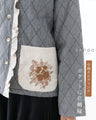 Quilted padding with floral embroidery on pockets Outerwear