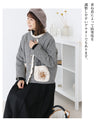 Quilted padding with floral embroidery on pockets Outerwear