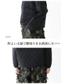 A quilted asymmetrical top that can be worn over the head