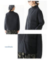A quilted asymmetrical top that can be worn over the head