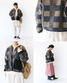 Quilted padding with floral embroidery on pockets Outerwear