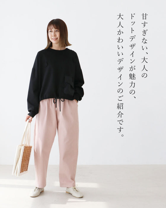 ワンポイントで差がつく遊び心ある一枚トップス