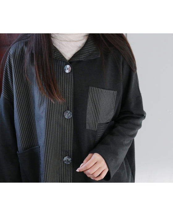 上品さとこなれ感を纏うストライプジャケット