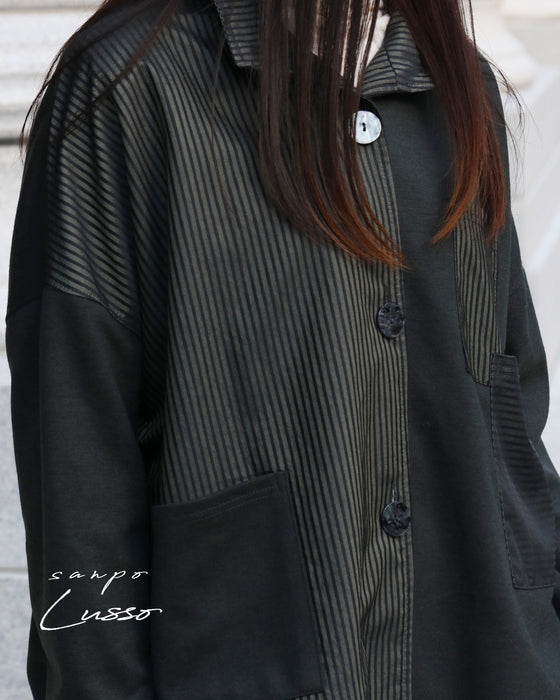 上品さとこなれ感を纏うストライプジャケット