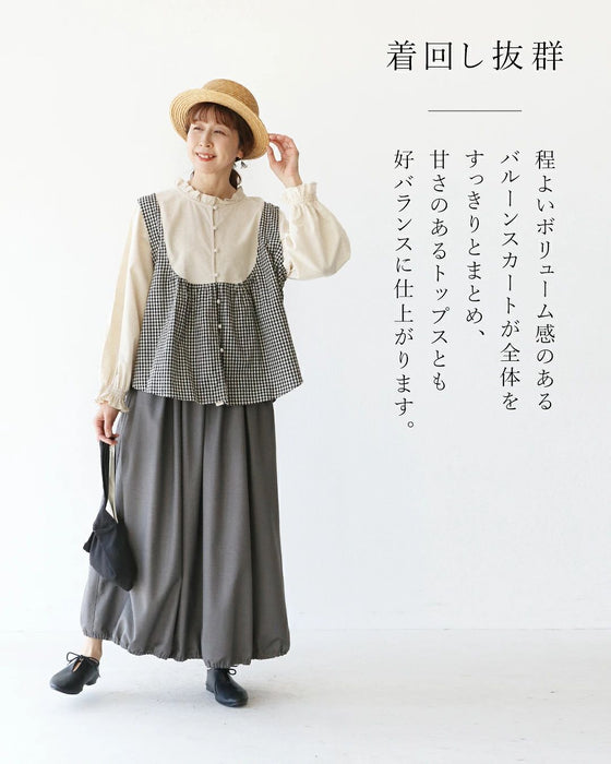 上品な佇まいを演出するバルーンスカート