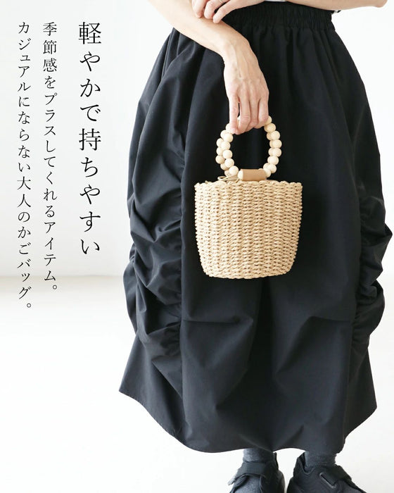 シンプルコーデの主役バッグ