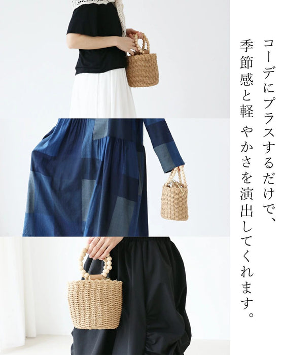 シンプルコーデの主役バッグ