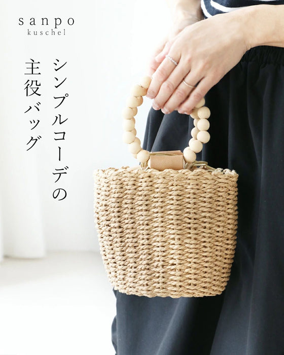 シンプルコーデの主役バッグ