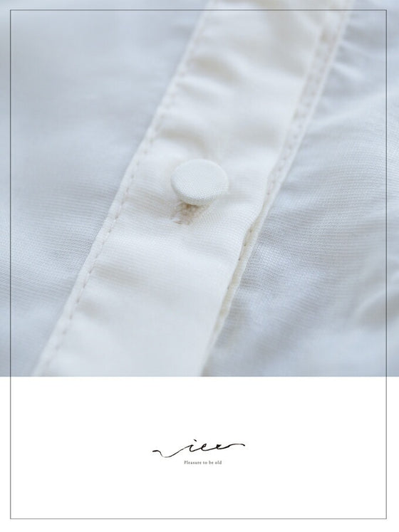 A loose shirt top with a hint of wood