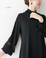 Tops with fluffy buds blooming on the sleeves