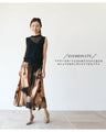 An evolved sleeveless top that's gorgeous with sheer and stones
