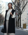Layer it up for a stylish look with this long gilet
