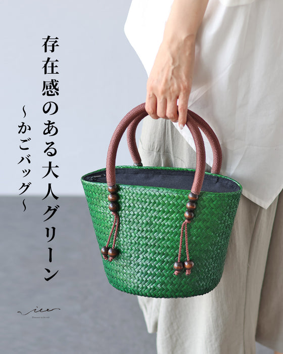A striking green basket bag for adults